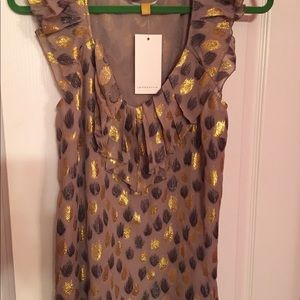 Gorgeous sleeveless top, NEVER worn, with tags.